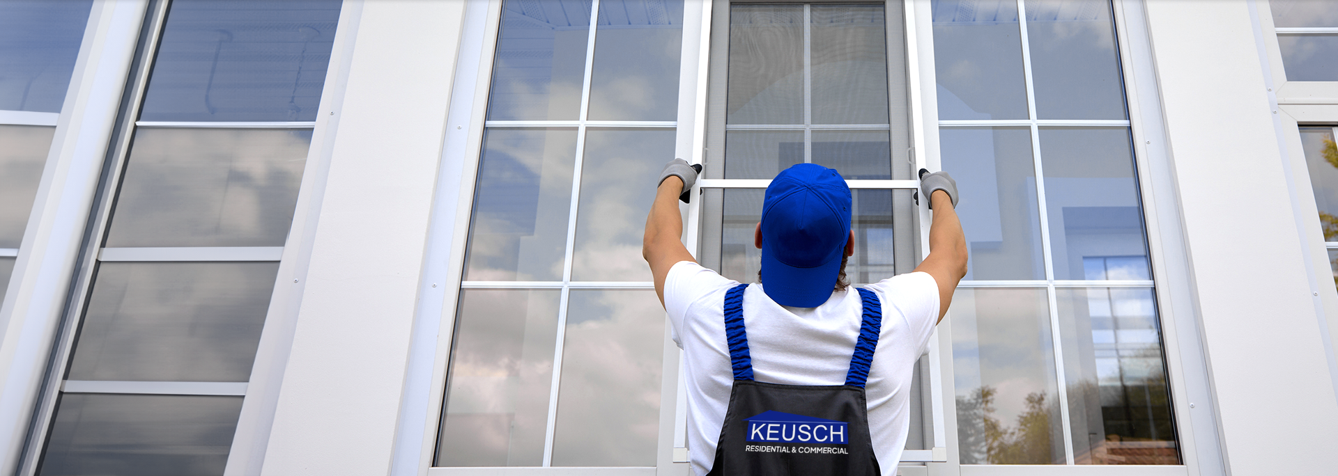 slider Worker installing residential window glass